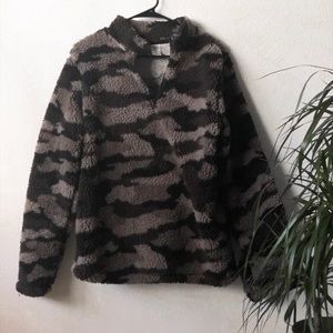Camouflaged zip up sweater